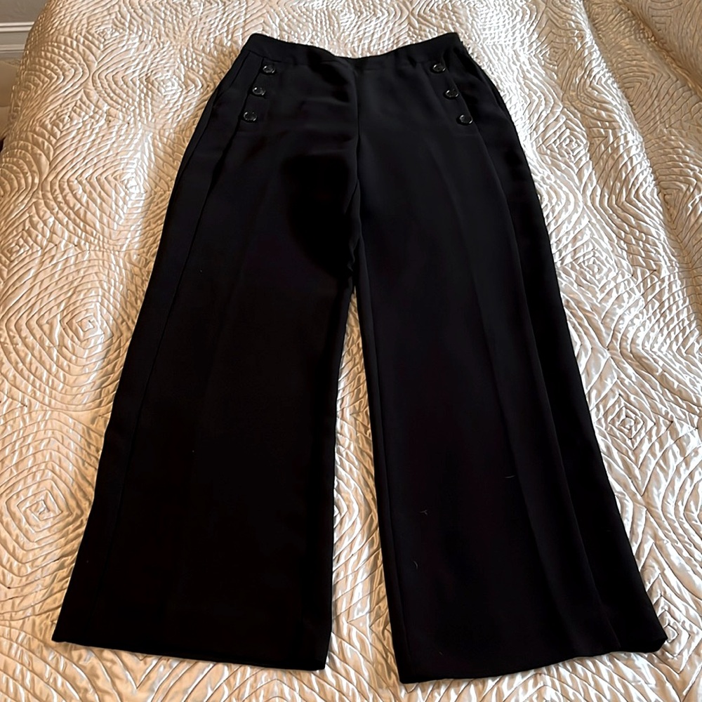 DKNY black “sailor” pants with buttons and side zipper.